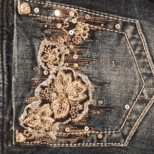 Like new, Miss Me, low rise, boot cut jeans